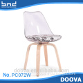 Dining Chair with wooden legs , Fancy Frame Plastic Chairs
